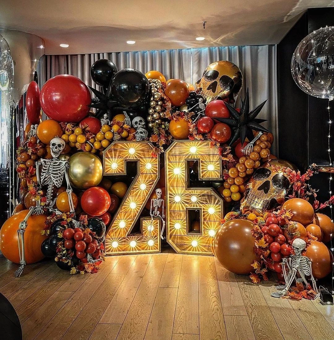 The most spooktacular setup! Throwing back to our Rustic Numbers lighting up this awesome Halloween Birthday balloon display by the super talented @balloon_bouquets